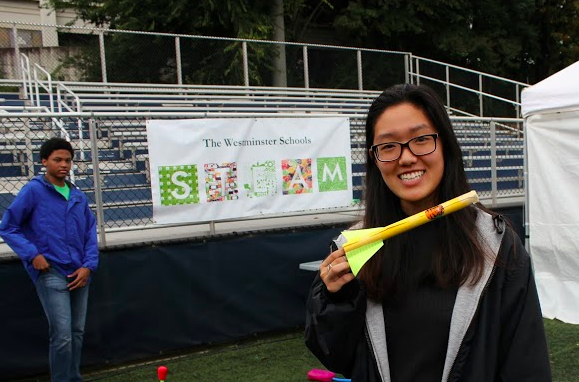 Senior Faith Cho at Westminsters booth 