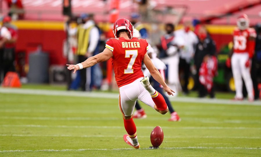Harrison Butker 13 in action punting for the Kansas City Chiefs.