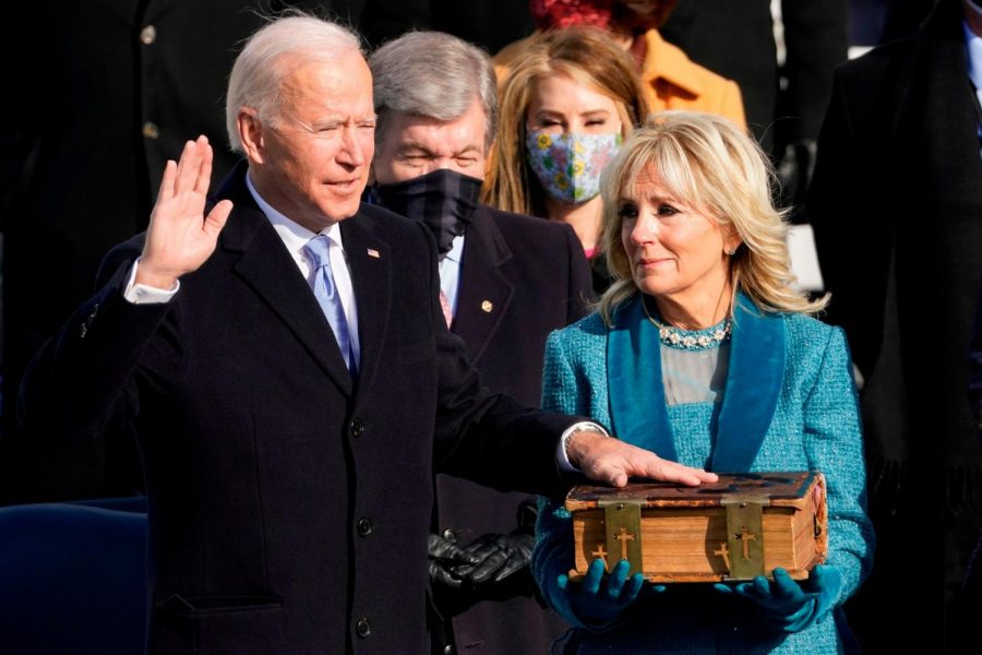 Joe Biden is sworn in alongside his wife Jill Biden. Source: Getty Images