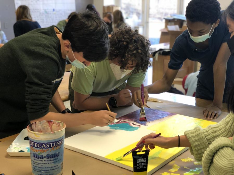 Group painting during the color JanTerm. 

Photo by Mario Chard, English teacher