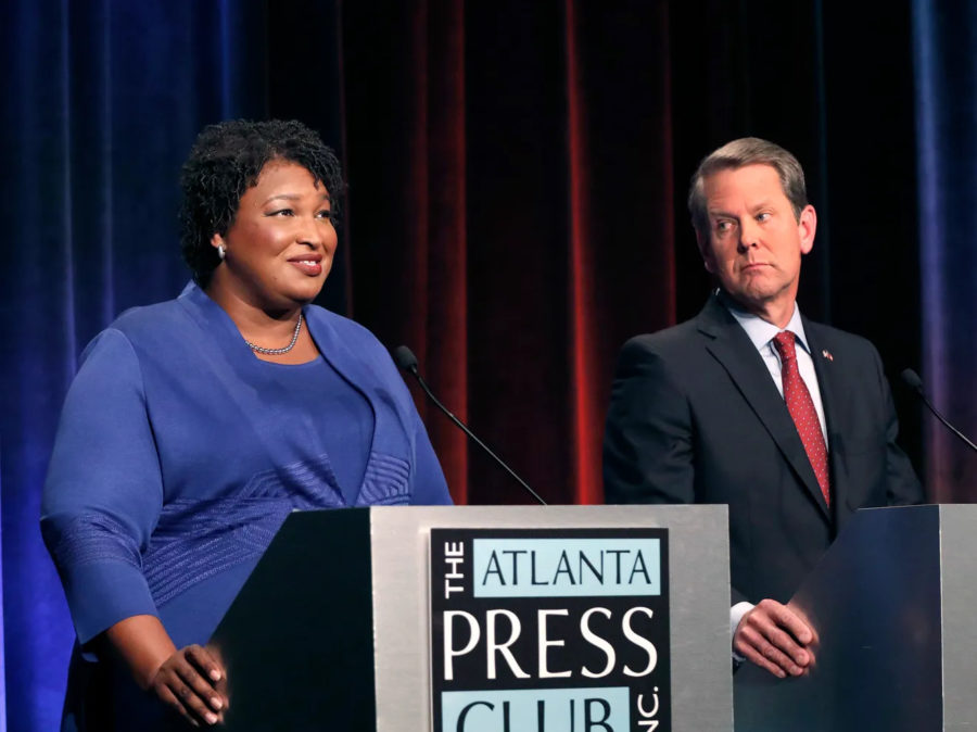 Stacey Abrams and Brian Kemp speak at a debate in Atlanta, Georgia for the Gubernatorial Elections. (Courtesy of USA Today) 
