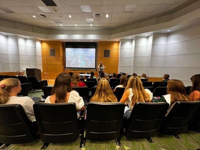 Members of the Womens Empowerment and Leadership club listening to Dana Spinola’s talk