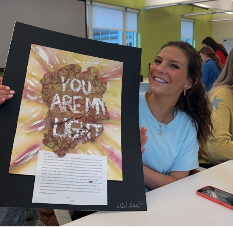 Ashlee Freeman showing off her gratitude letter in the “Cultivating Well Being Through Art and Psychology” JanTerm’s gratitude lunch. Everyone in the JanTerm brought in someone who they are thankful for and created a handmade gratitude letter with paper that they made themselves!